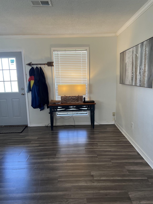 497 Law 611, Walnut Ridge, AR 72476 - dining room with ornamental molding, wood finished floors, and a textured ceiling