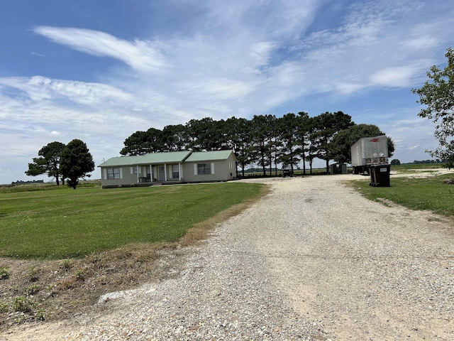 497 Law 611, Walnut Ridge, AR 72476 - view of front of home featuring gravel driveway and a front lawn