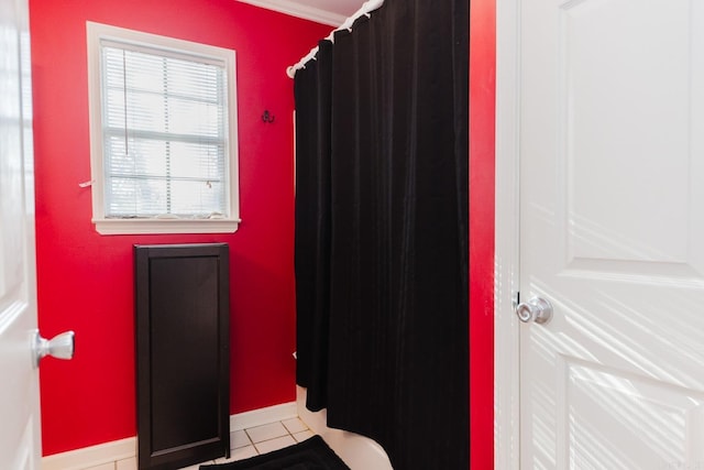 1304 Winbourne Dr, North Little Rock, AR 72116 - bathroom featuring tile patterned flooring and a shower with shower curtain