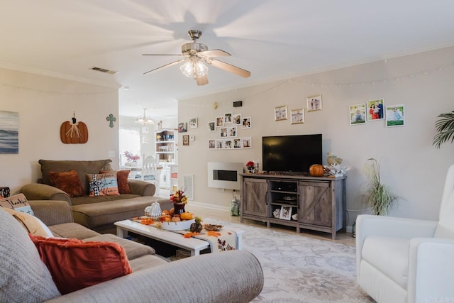 1304 Winbourne Dr, North Little Rock, AR 72116 - living area featuring ceiling fan, ornamental molding, and a chandelier