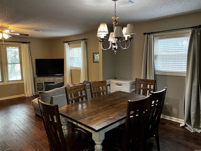 39 Dike View Dr, Heber Springs, AR 72543 - dining space featuring a textured ceiling, a ceiling fan, dark wood finished floors, and a chandelier