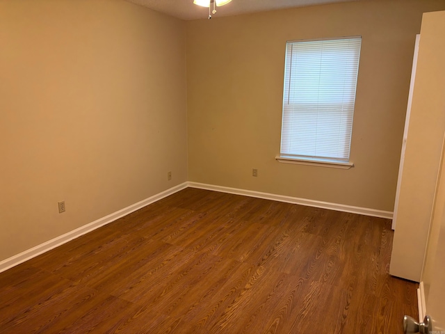 112 Sugar Maple Dr, Sherwood, AR 72120 - spare room featuring dark wood-style flooring and a ceiling fan