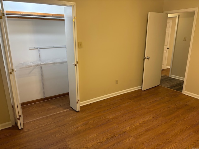 112 Sugar Maple Dr, Sherwood, AR 72120 - unfurnished bedroom featuring dark wood finished floors and a closet