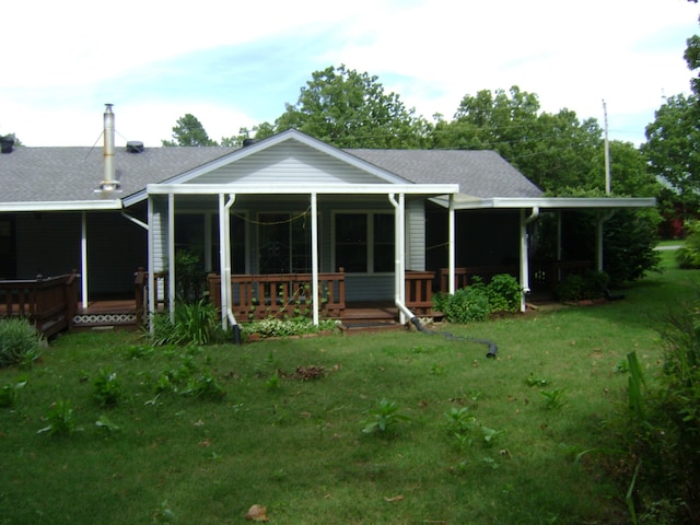 405 Fairway Dr, Horseshoe Bend, AR 72512 - rear view of property with a yard, a porch, and roof with shingles