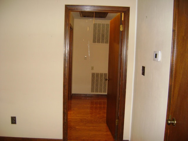 405 Fairway Dr, Horseshoe Bend, AR 72512 - hall featuring wood finished floors and attic access