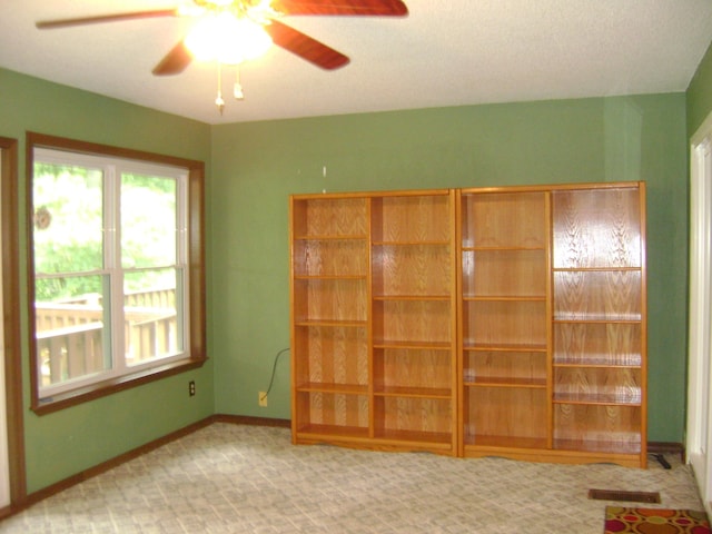 405 Fairway Dr, Horseshoe Bend, AR 72512 - spare room with ceiling fan and carpet