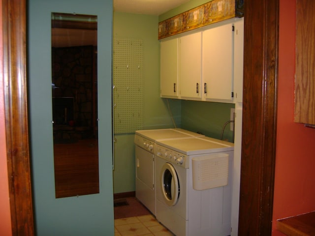405 Fairway Dr, Horseshoe Bend, AR 72512 - laundry area featuring cabinet space and washing machine and clothes dryer