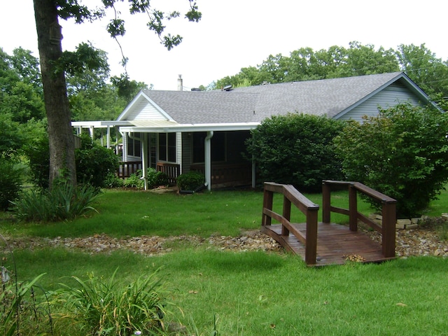 405 Fairway Dr, Horseshoe Bend, AR 72512 - view of front of home featuring a front lawn, roof with shingles, covered porch, and a chimney