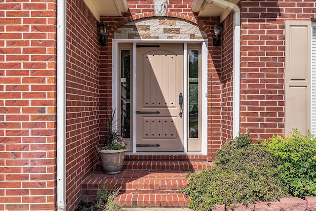 15355 Pleasant Grove Ln, Harrisburg, AR 72432 - doorway to property with brick siding