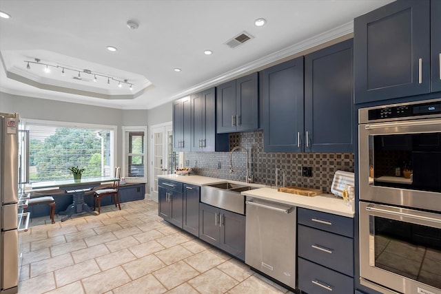 15355 Pleasant Grove Ln, Harrisburg, AR 72432 - kitchen featuring stainless steel appliances, tasteful backsplash, ornamental molding, light countertops, and recessed lighting