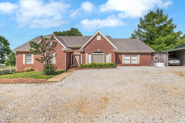 15355 Pleasant Grove Ln, Harrisburg, AR 72432 - view of front of property featuring brick siding, driveway, and roof with shingles