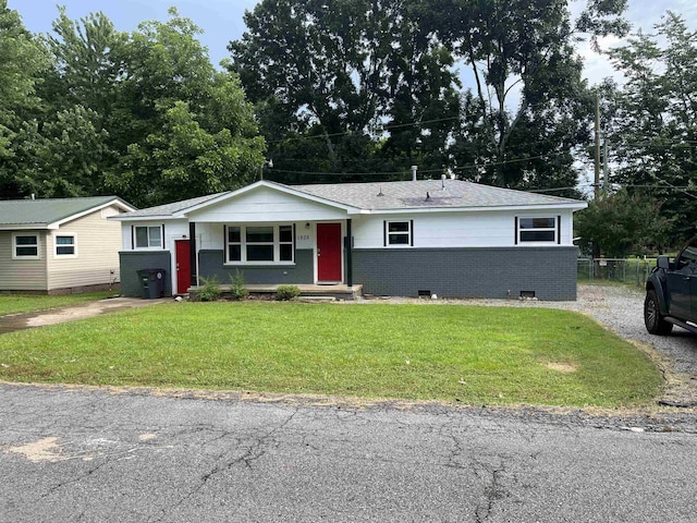 1505 W Park Ave, Searcy, AR 72143 - ranch-style home featuring brick siding and a front lawn