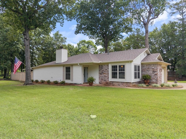 101 Rolling Oaks Dr, Maumelle, AR 72113 - ranch-style house featuring a chimney, a front yard, an attached garage, and a shingled roof