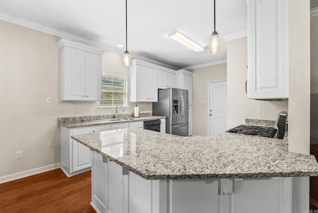 kitchen with stainless steel fridge, ornamental molding, white cabinets, dark wood-style floors, and a peninsula