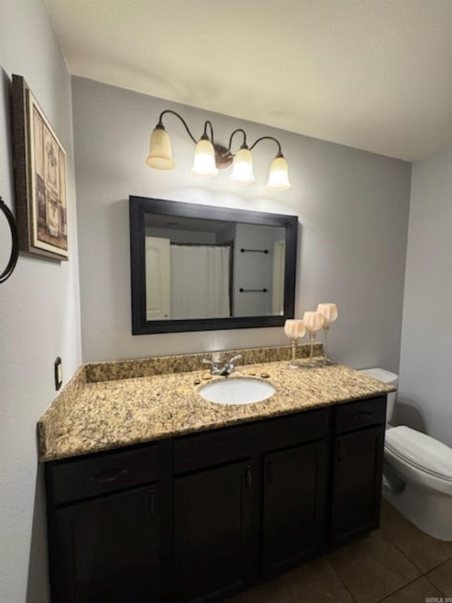 bathroom with vanity and tile patterned floors