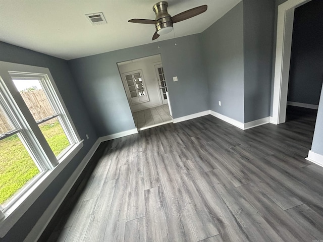 261 E Military, North Little Rock, AR 72118 - spare room with dark wood-style flooring and ceiling fan