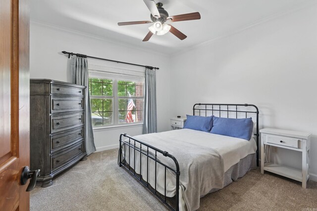 2716 Juniper Dr, Benton, AR 72015 - bedroom with carpet, ornamental molding, and a ceiling fan