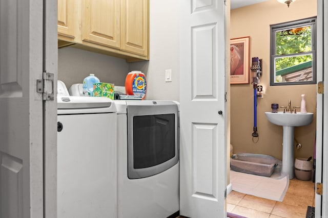 232 Alydar Trl, Hot Springs, AR 71901 - laundry area featuring cabinet space, washing machine and clothes dryer, and tile patterned flooring