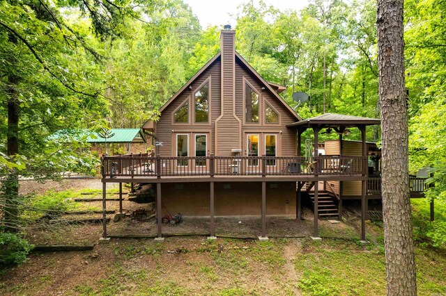 232 Alydar Trl, Hot Springs, AR 71901 - back of property with a deck, a gazebo, a chimney, and stairway