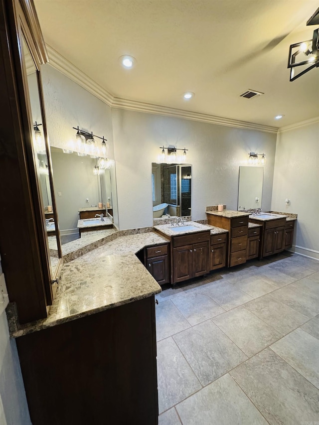 350 Wellesley, Conway, AR 72034 - full bath with ornamental molding, two vanities, and recessed lighting