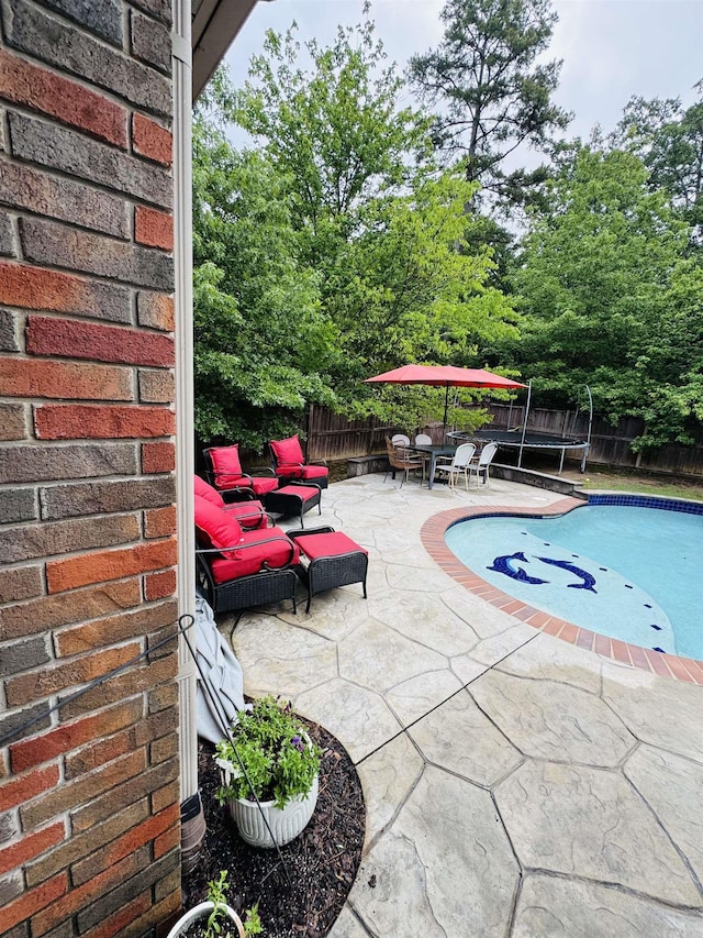 350 Wellesley, Conway, AR 72034 - view of swimming pool featuring a patio area, a fenced backyard, and outdoor dining space