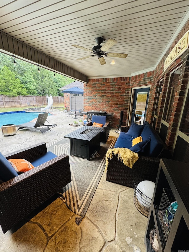 350 Wellesley, Conway, AR 72034 - fenced backyard featuring outdoor lounge area, a patio area, and ceiling fan