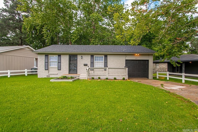 2911 Wynne Dr, Little Rock, AR 72204 - ranch-style home with an attached garage, concrete driveway, and roof with shingles