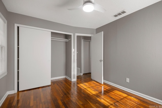 2911 Wynne Dr, Little Rock, AR 72204 - unfurnished bedroom featuring hardwood / wood-style floors, a closet, and a ceiling fan