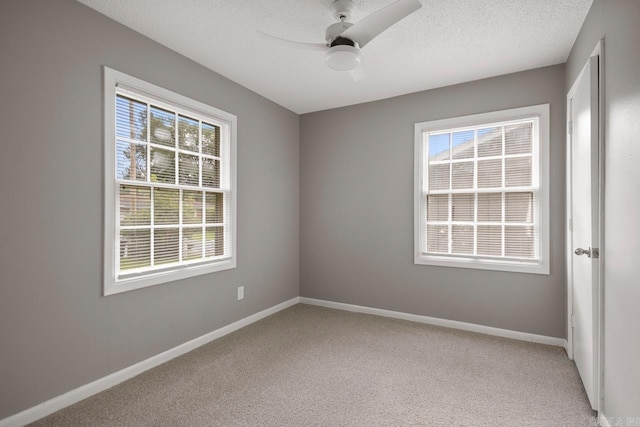 2911 Wynne Dr, Little Rock, AR 72204 - spare room featuring light carpet, a ceiling fan, and a textured ceiling