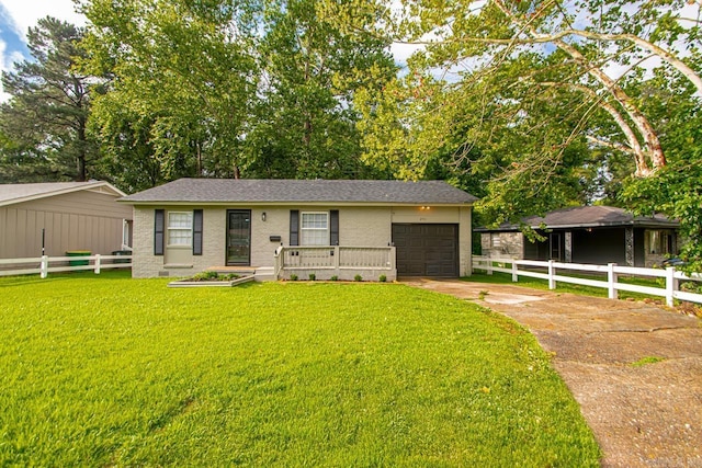 2911 Wynne Dr, Little Rock, AR 72204 - single story home with driveway, an attached garage, brick siding, and roof with shingles