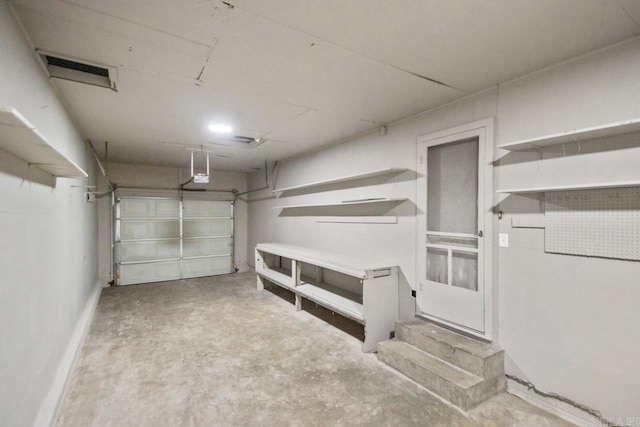 2911 Wynne Dr, Little Rock, AR 72204 - garage featuring a garage door opener