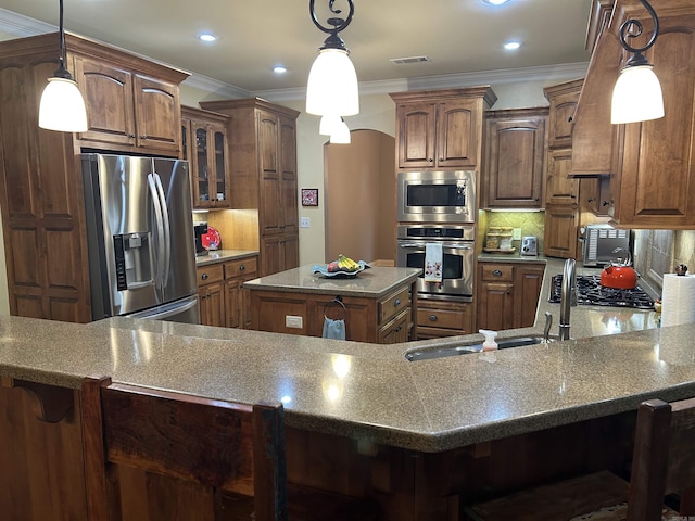 2205 Vermont St, Conway, AR 72034 - kitchen featuring stainless steel appliances, ornamental molding, glass insert cabinets, backsplash, and a breakfast bar area