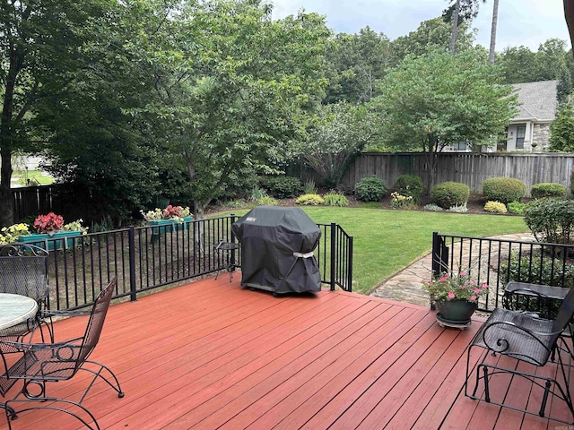 2205 Vermont St, Conway, AR 72034 - wooden deck featuring grilling area and a fenced backyard