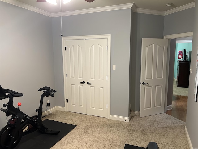2205 Vermont St, Conway, AR 72034 - exercise area featuring carpet floors, ornamental molding, and a ceiling fan
