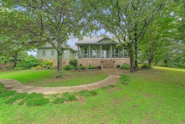 113 Friendship Ln, Beebe, AR 72012 - view of front of property with a porch, brick siding, and a front yard