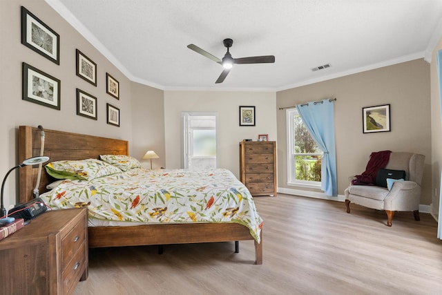 113 Friendship Ln, Beebe, AR 72012 - bedroom with wood finished floors, crown molding, and a ceiling fan