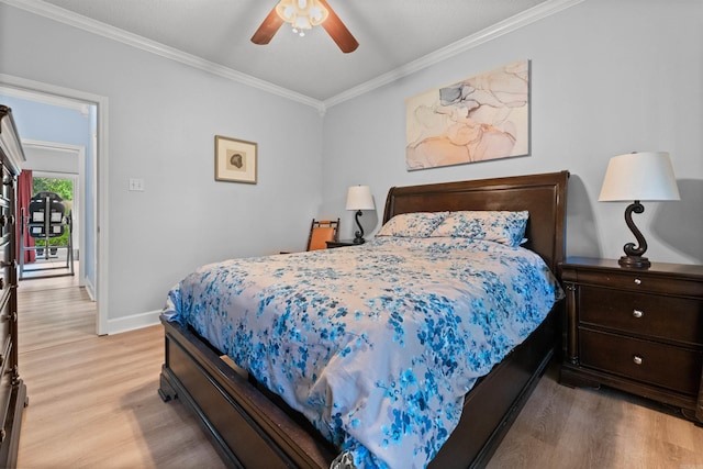 113 Friendship Ln, Beebe, AR 72012 - bedroom featuring light wood-style floors, ornamental molding, and a ceiling fan