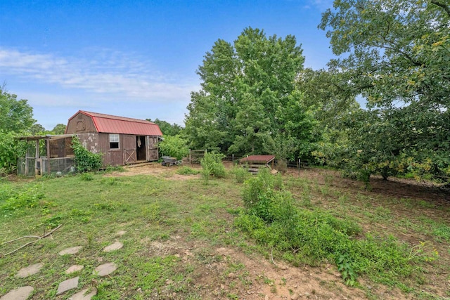 113 Friendship Ln, Beebe, AR 72012 - view of yard featuring an outdoor structure and a barn