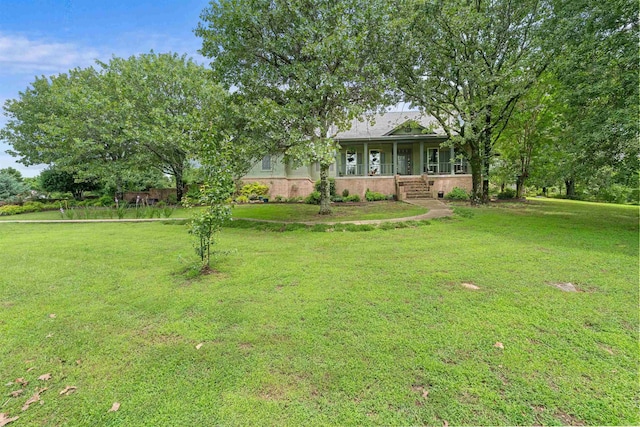 113 Friendship Ln, Beebe, AR 72012 - view of green lawn featuring covered porch