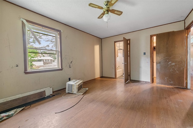 27 Arbor Oaks Dr, Sherwood, AR 72120 - empty room with wood finished floors, ceiling fan, and a textured ceiling