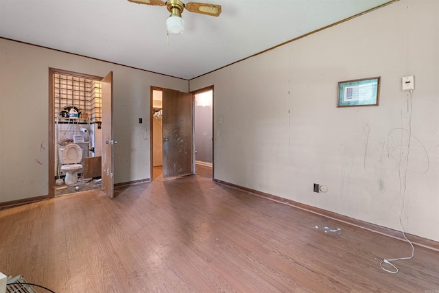 27 Arbor Oaks Dr, Sherwood, AR 72120 - unfurnished bedroom with wood finished floors and a ceiling fan