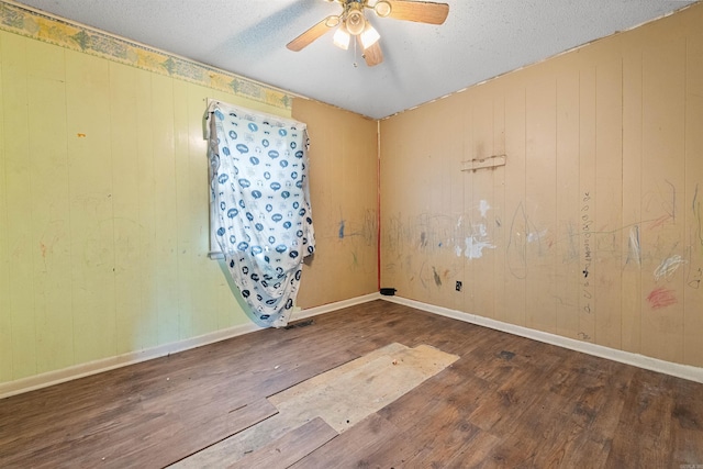27 Arbor Oaks Dr, Sherwood, AR 72120 - unfurnished room with wood finished floors, ceiling fan, and a textured ceiling