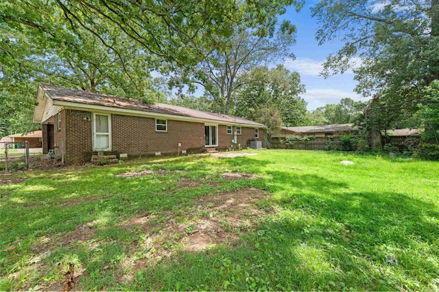 27 Arbor Oaks Dr, Sherwood, AR 72120 - back of property with brick siding