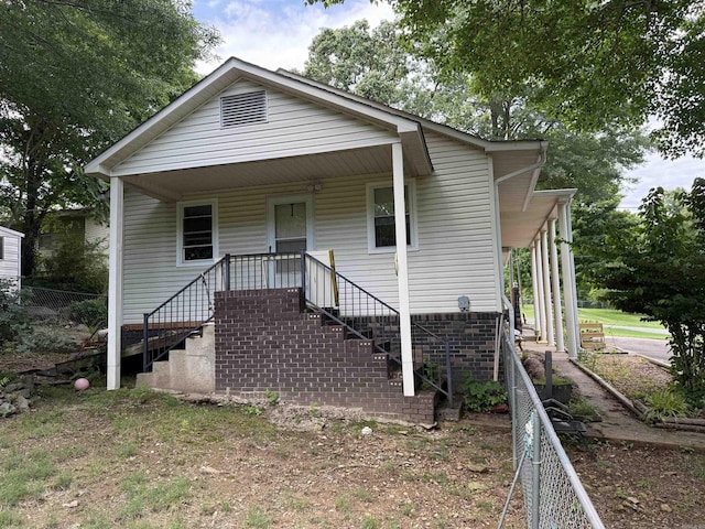 510 N 4th St, Heber Springs, AR 72543 - view of front of house featuring stairway and a porch