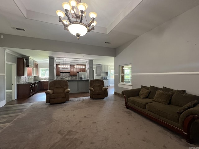 5942 Joey Ln, Texarkana, AR 71854 - living room with a chandelier and a tray ceiling