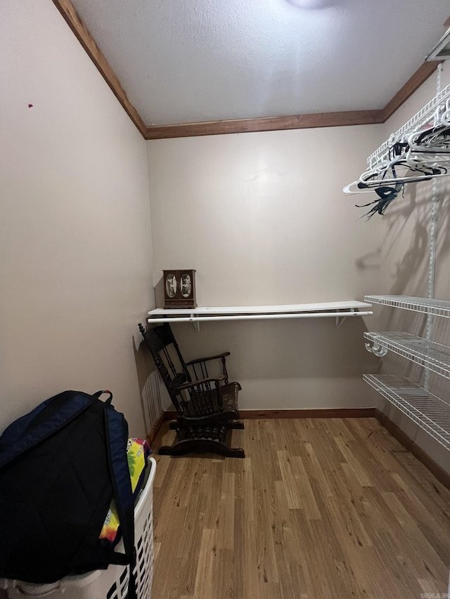 5942 Joey Ln, Texarkana, AR 71854 - walk in closet featuring wood finished floors
