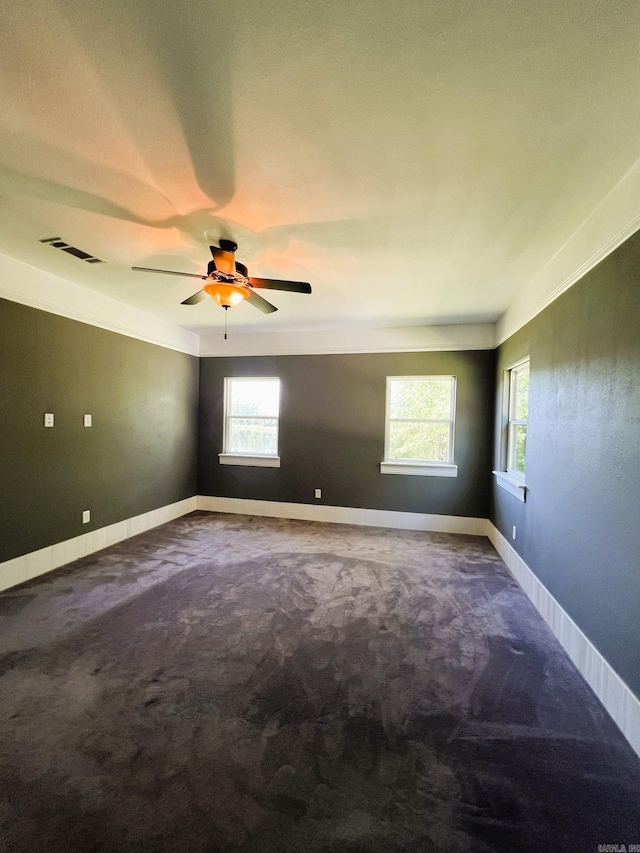 5942 Joey Ln, Texarkana, AR 71854 - carpeted empty room with healthy amount of natural light and ceiling fan