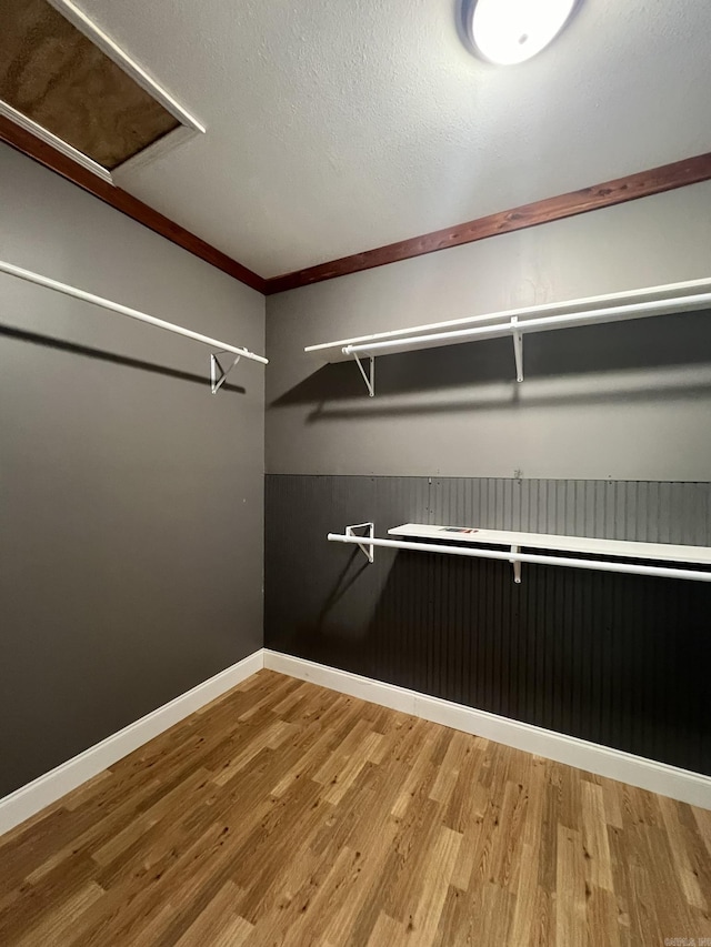 5942 Joey Ln, Texarkana, AR 71854 - spacious closet featuring wood finished floors and attic access
