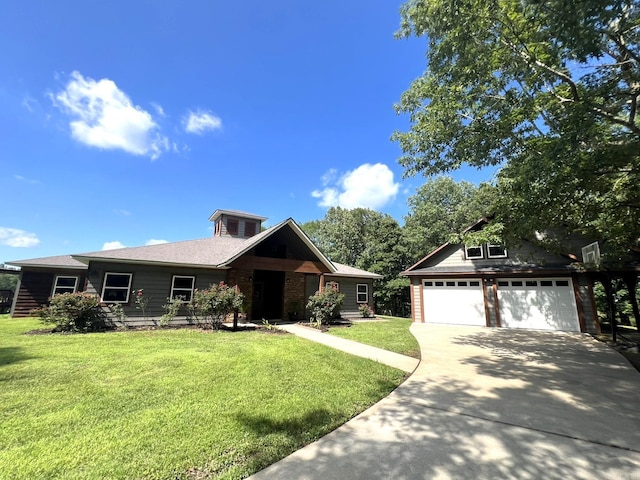 5942 Joey Ln, Texarkana, AR 71854 - view of front of home with concrete driveway, a garage, and a front yard