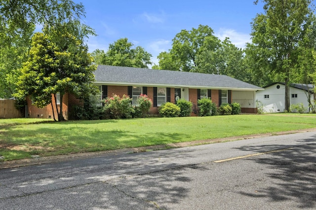 1903 W Arch Ave, Searcy, AR 72143 - single story home featuring brick siding and a front yard